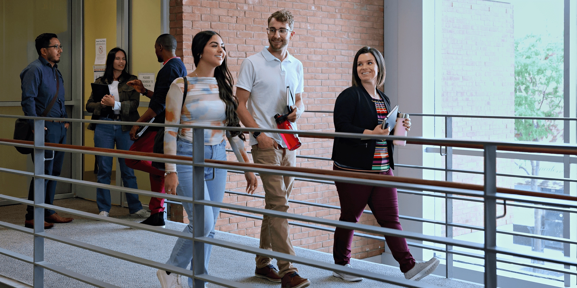 Students walking and talking at the UNF corridor