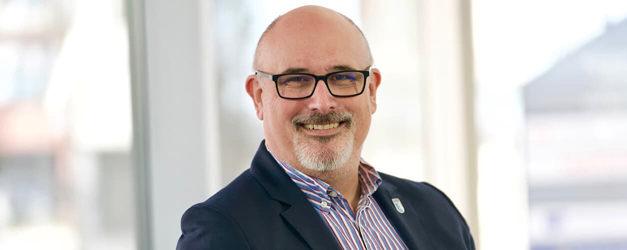 A portrait image of David Gray