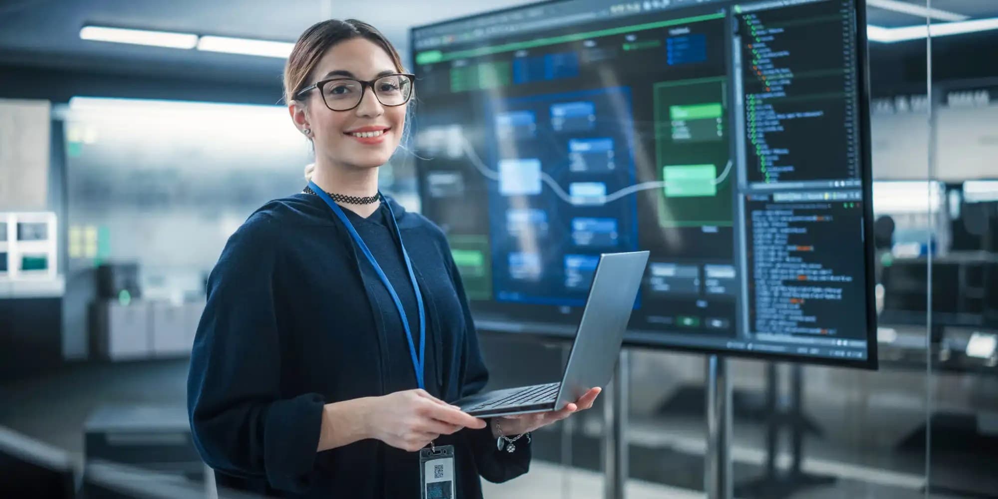a computer data technician standing inside a lab