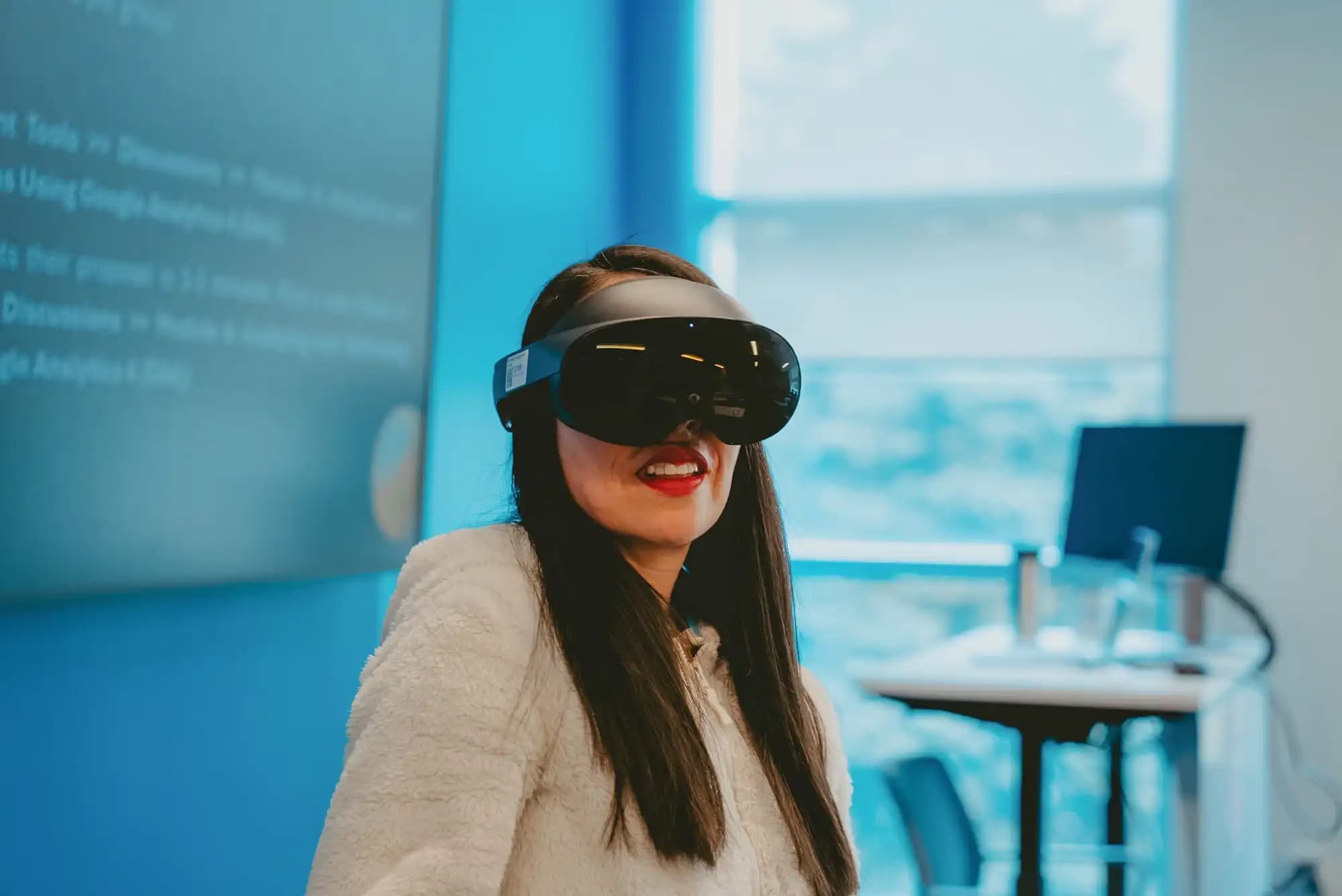 A woman wearing a virtual reality headset