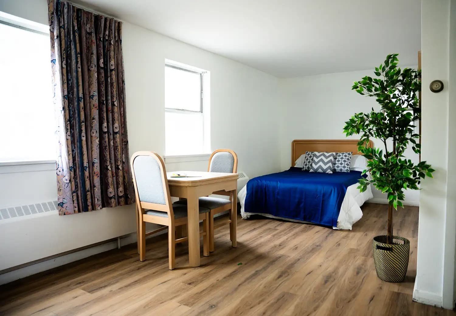 Student Residences room with a single bed and a study table