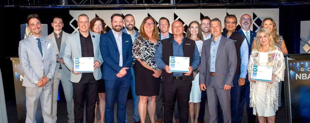 UNF staffs holding the finalist in the Niagara Business Achievement Awards