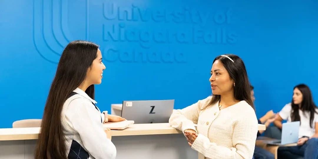 UNF students standing by the reception
