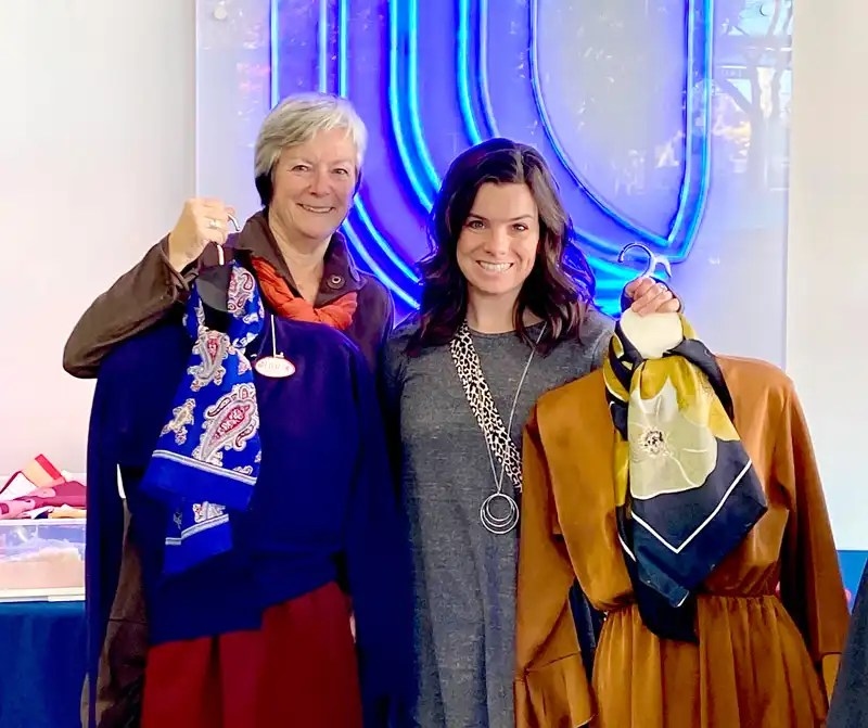 Nearly New Thrift Store and UNF staff seen in the picture